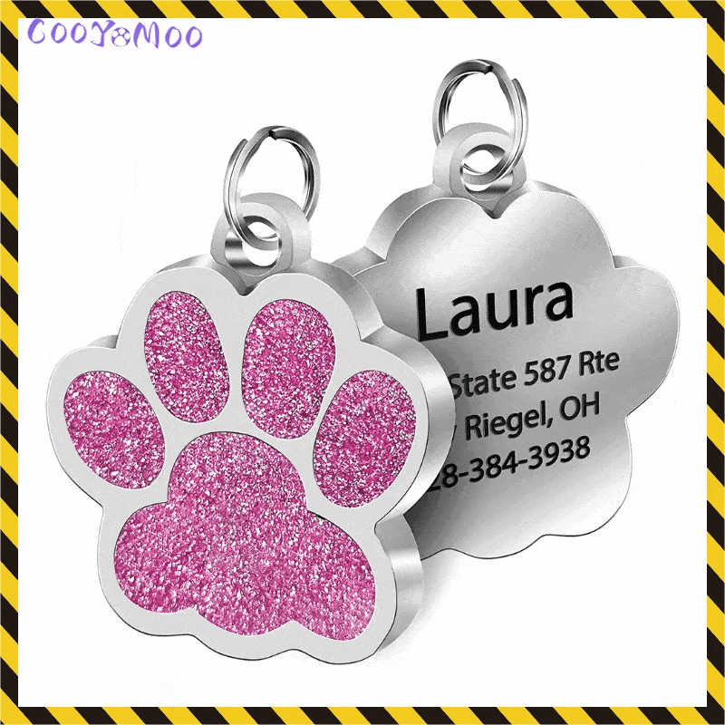Personalized silver paw print pet ID tag with engraved name and contact details