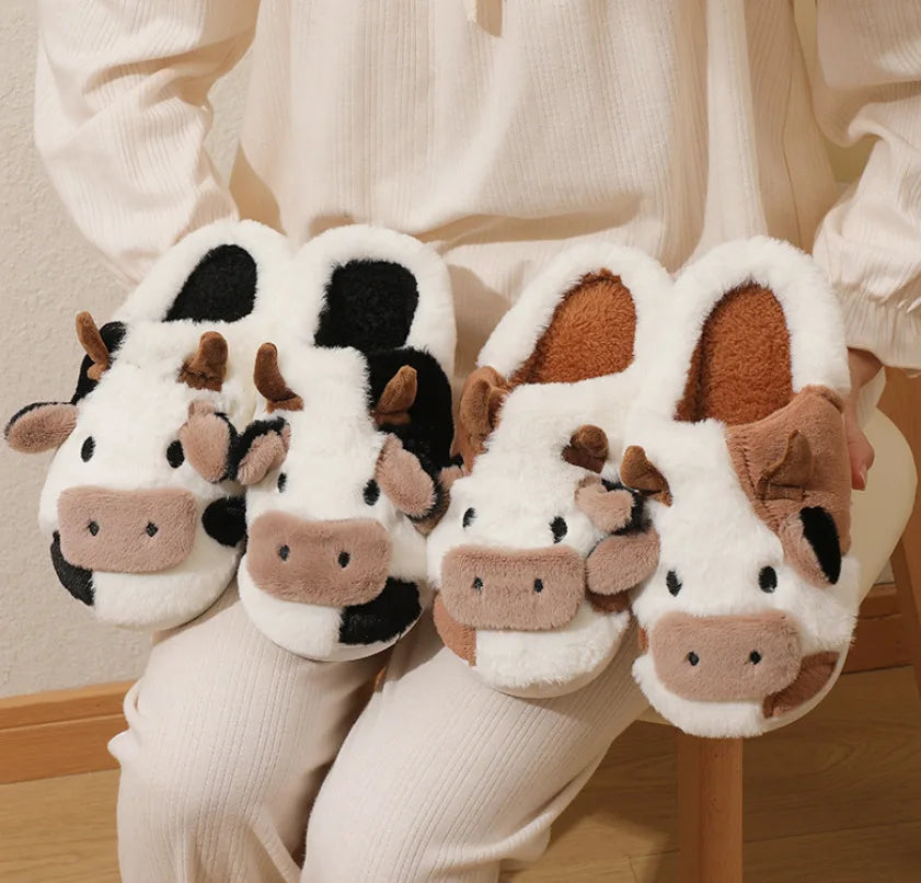 Cute cow print plush slippers with brown and white animal design