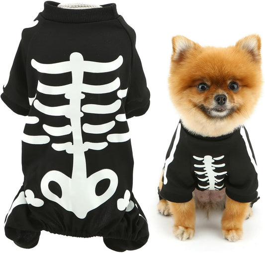 dog wearing a black skeleton Halloween costume with white bone print